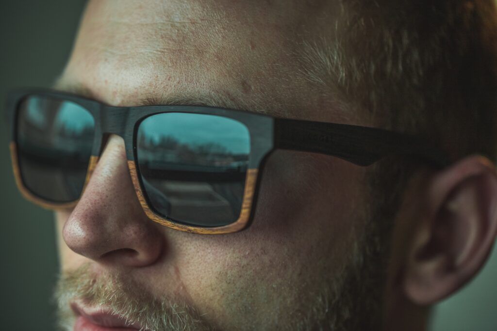 photo of man wearing sunglasses