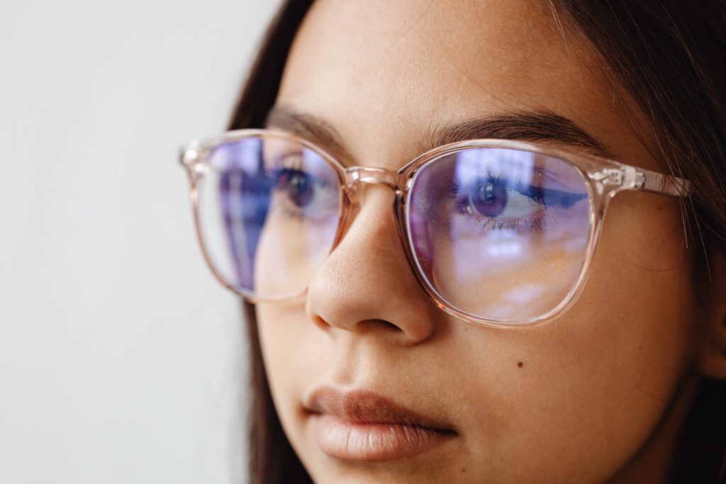 photo of girl wearing glasses