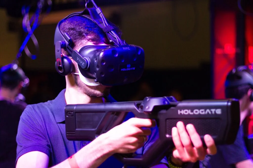photo of a man wearing VR headset
