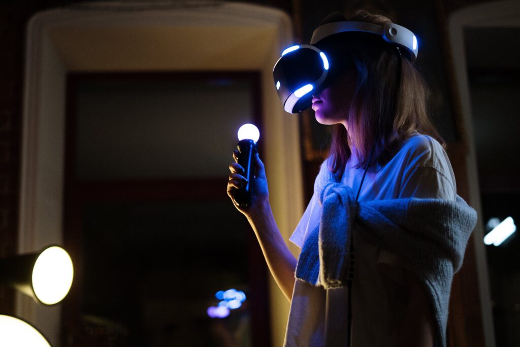 photo of woman wearing cool VR glasses