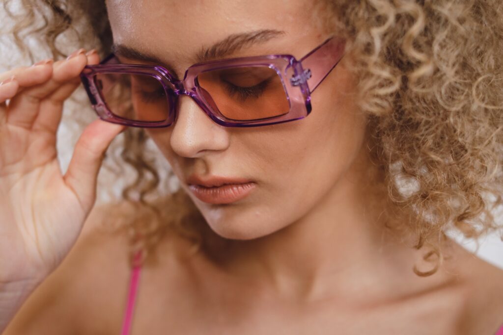 photo of woman wearing sunglasses