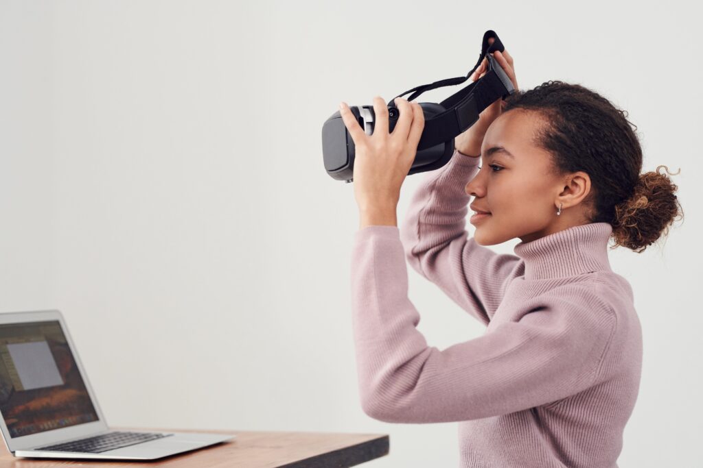 photo of woman preparing to wear smart headset