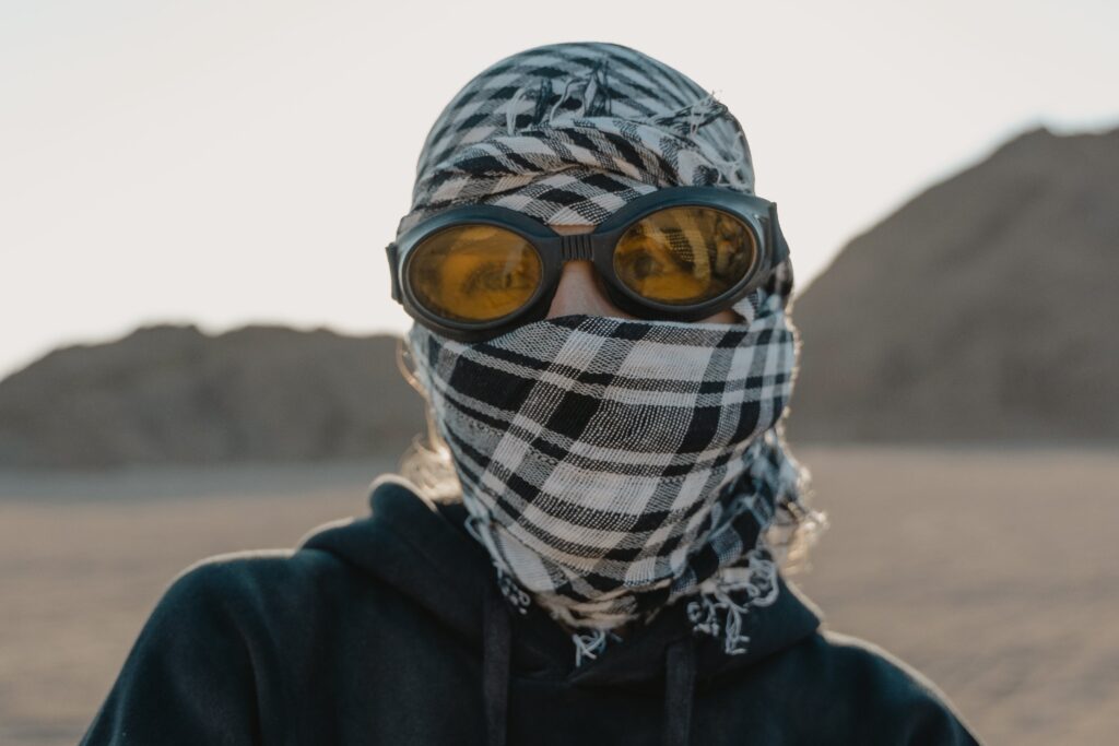 photo of man wearing sports goggles