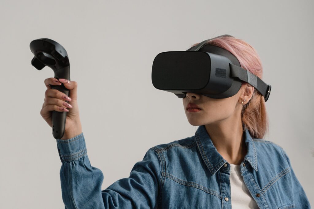 photo of young woman wearing mixed reality glasses